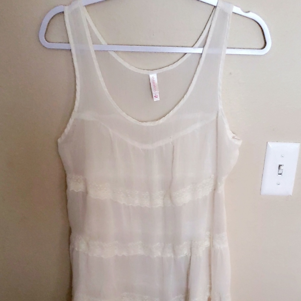 Sheer offwhite sleeveless blouse